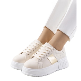 Beige sneakers on the Avenid platform golden Beige sneakers on the Avenid platform golden