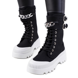 Black sneakers with Taus chain