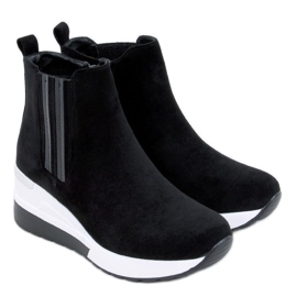 Stock Black wedge boots