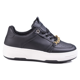 Women's black sneakers on a platform with a Shelovet chain