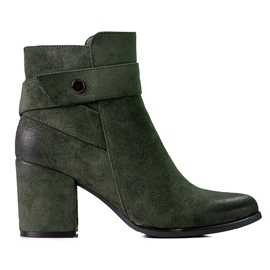 Green women's boots on the post made of ecological Shelovet suede