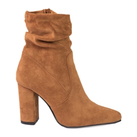 Brown women's boots on the Shelovet post with a ruffled upper