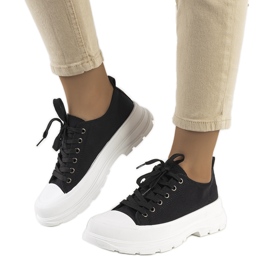 Black sneakers on a thick Ardglass sole