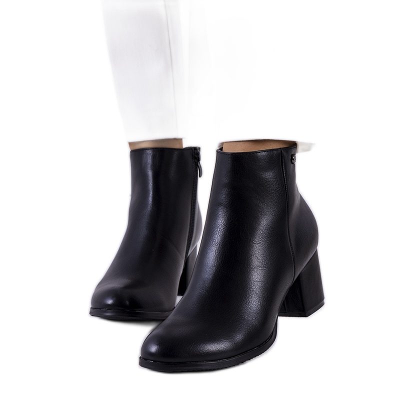 Black boots on the post of eco-leather Durnatel