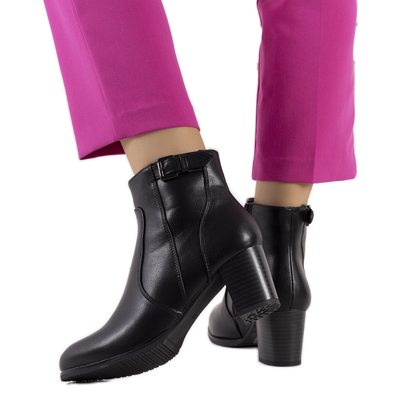 Black boots on a low post from Bogota