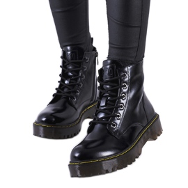 Black boots with a decorative Yuliya thread