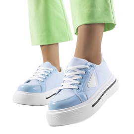 Blue sneakers with a thick Scrabster sole