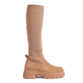 Ladies' beige boots with a flexible uppers