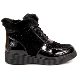 Black Rieker 93312-00 leather insulated leather boots on the platform