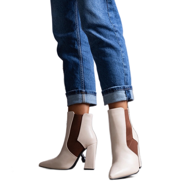 Beige Chelsea boots on the Hamilt post