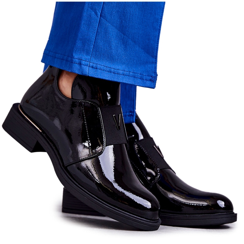 Vinceza Lacquered boots with cutouts on a flat heel Black Eunice