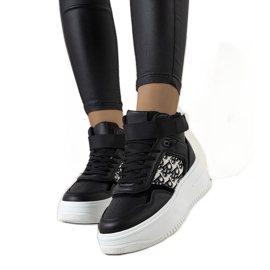 Black sneakers from Adolis