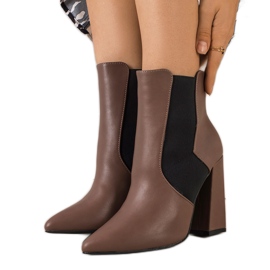 Brown Chelsea boots on the Hamilt post