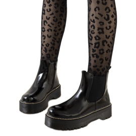 Black boots on a high Esilal platform