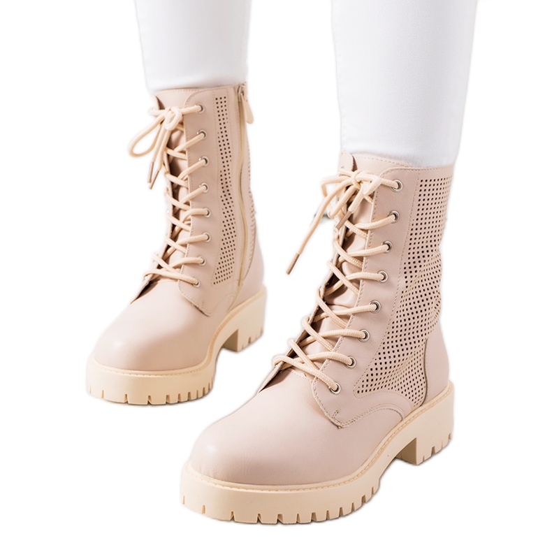 Beige boots on a high Loop sole