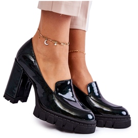 Fashionable Lacquered Pumps On A Massive Green Margott Platform