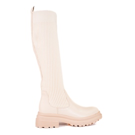 Beige boots with a flexible Shelovet upper