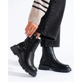 Black women's Chelsea boots with a black sole