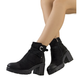 Black boots on a Lamaris tractor sole Black boots on a Lamaris tractor sole