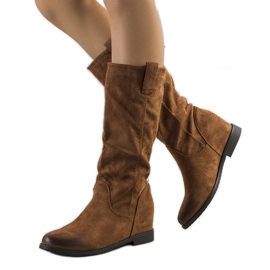 PA1 Brown boots on a Mae indoor wedge heel