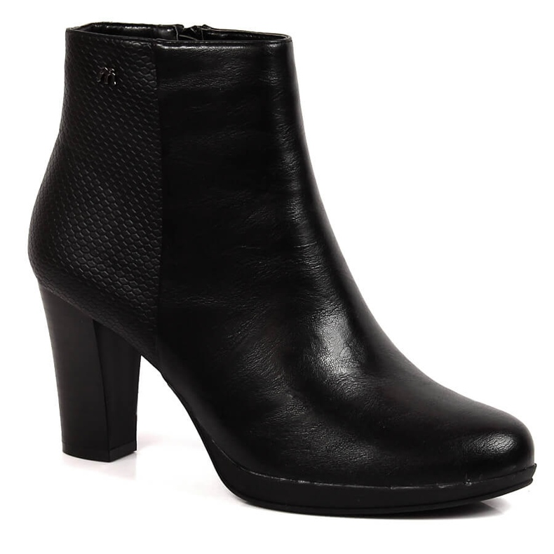 Black insulated women's boots on the post by M. Daszyński