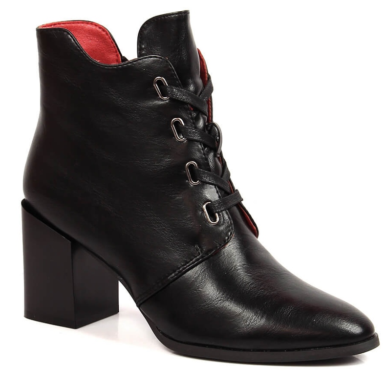 Black insulated women's boots on the post by M. Daszyński