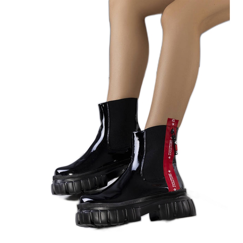 Black patent leather boots from Casta