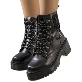 Black boots with a decorative Laverda binding