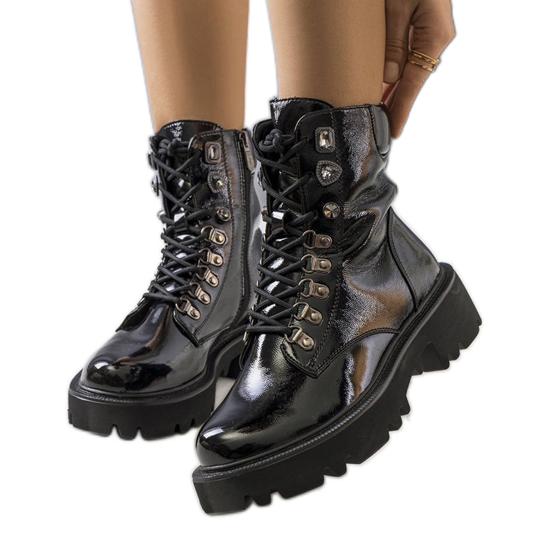 PA1 Black boots on the tractor sole of Iglesi