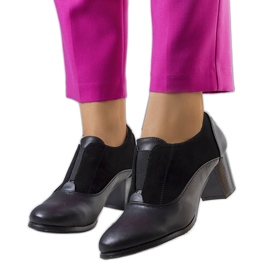 BM Black lace-up shoes on the Corder post