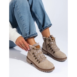 Ladies' beige boots with sheepskin coat Ladies' beige boots with sheepskin coat