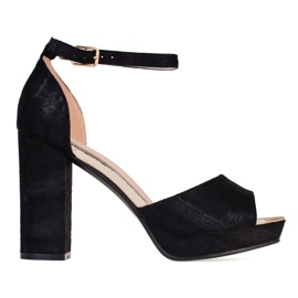 Ladies' black pumps on a wide Shelovet post