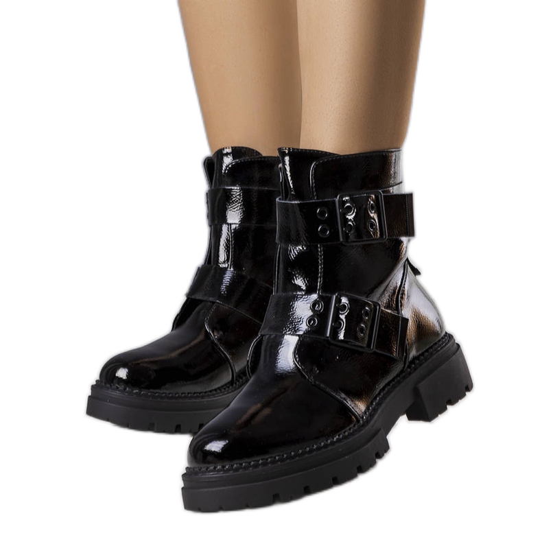Black lacquered insulated boots from Faleri