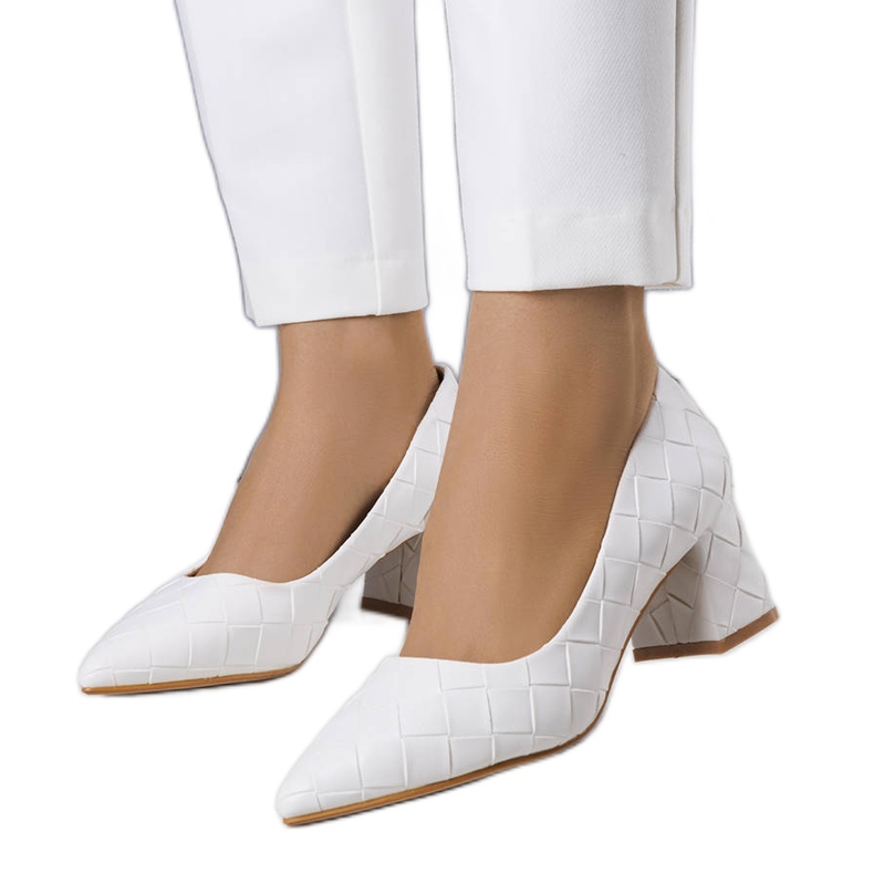 BM White heeled pumps from Migne