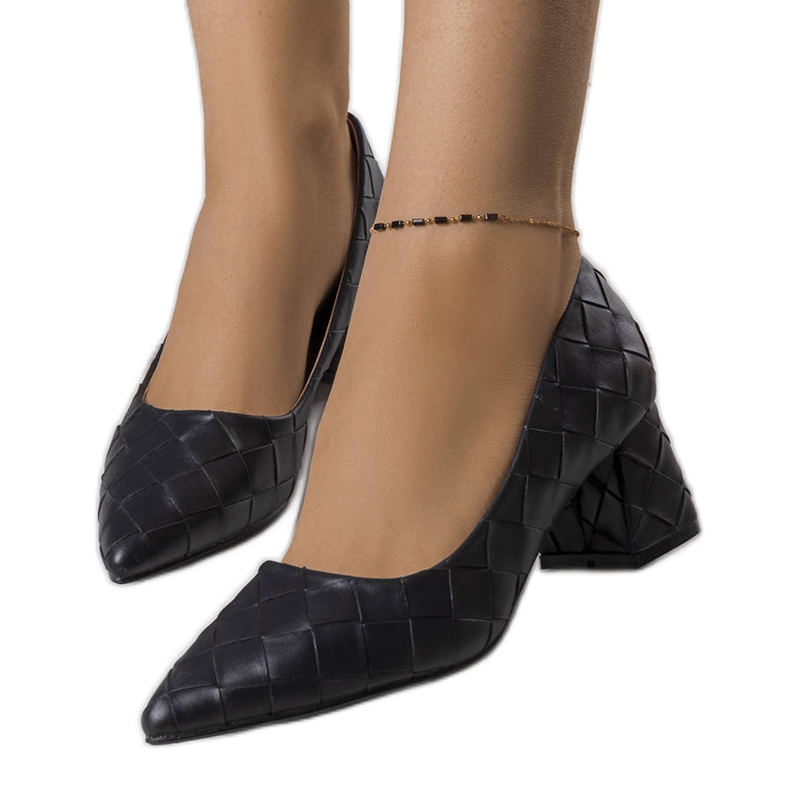 Black heeled pumps from Migne