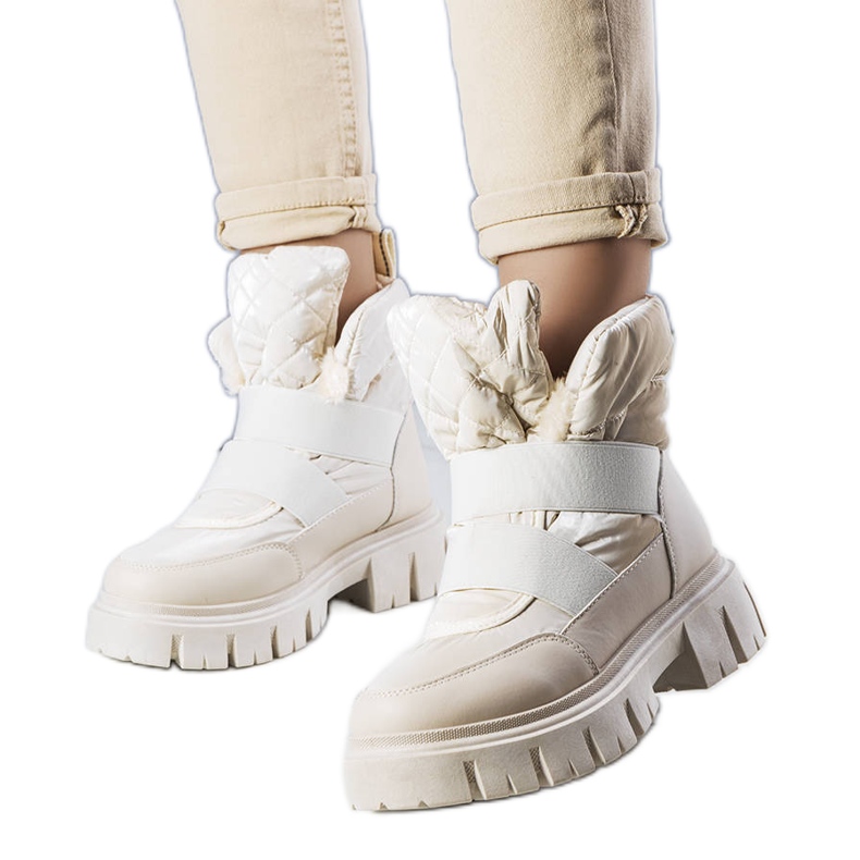 Beige insulated slip-on snow boots from Francisco