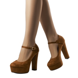 High-heeled brown pumps