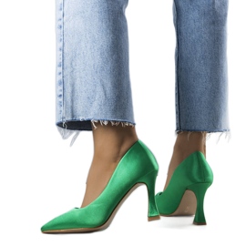 Green pumps with an hourglass heel from Otto