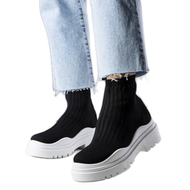 Cali black sock boots with a white sole