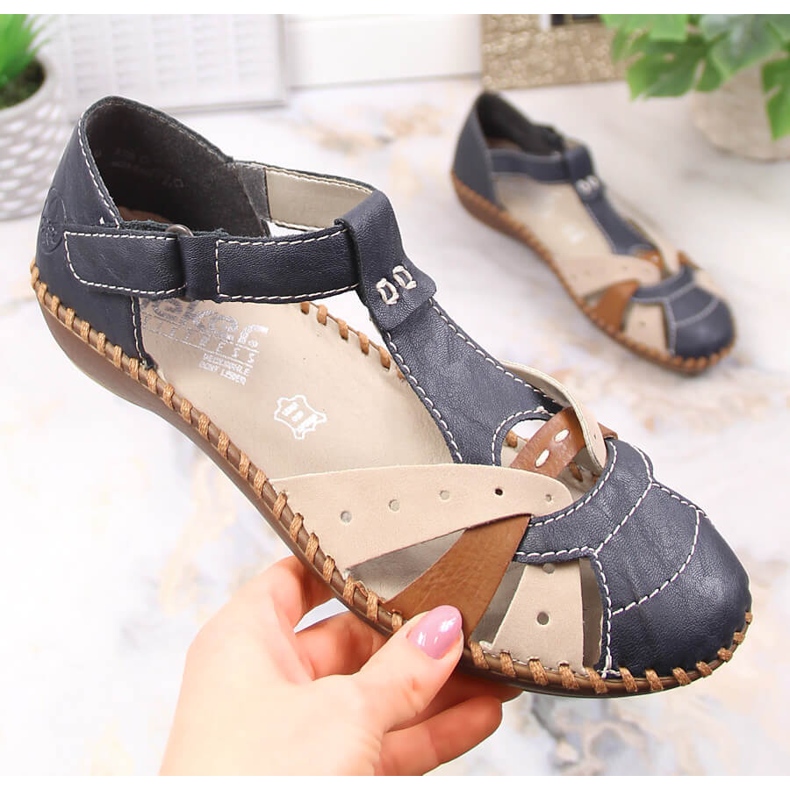 Comfortable women's flat sandals with Velcro Rieker M1655-14 beige Comfortable women's flat sandals with Velcro Rieker M1655-14 beige