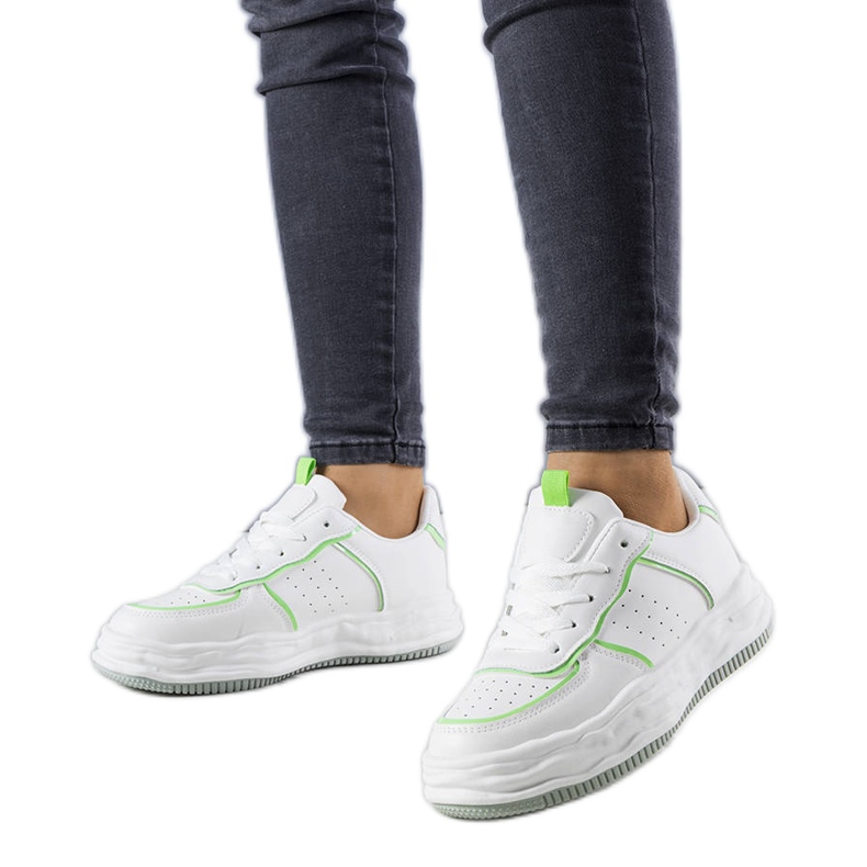 White sneakers with green inserts from Nettie