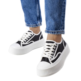 Black platform sneakers from Delores