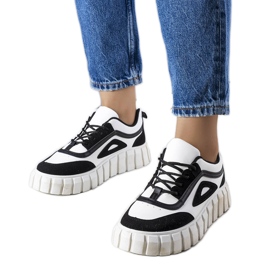 Black platform sneakers from Robyn