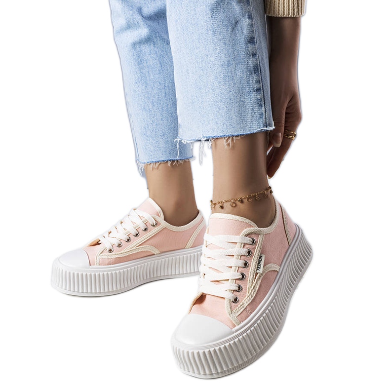 Connie's pink platform sneakers