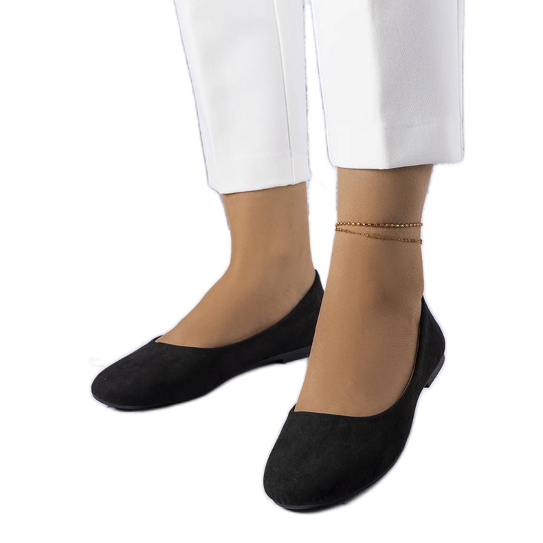 Black flats with a leather footbed from Lespérance