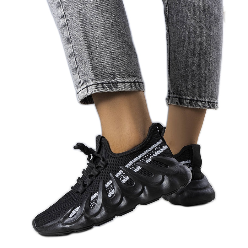 Black sneakers on a fashionable Beth sole
