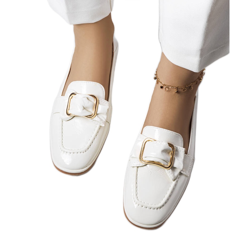 White patent leather loafers from Erica