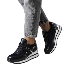 Black sneakers with a thick sole from Mely