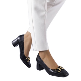 Black square toe pumps from Neufville