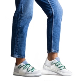 Gray sneakers with green laces from Aucoin white